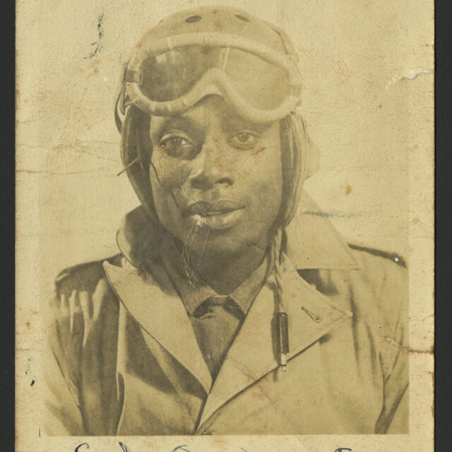 A black-and-white photograph of Venus Jones' father, Albert Jones Jr.. At the bottom of the photo is a handwritten caption which reads "Sgt. A. Jones, 784 Tk. Bn., Camp Hood, Tex."