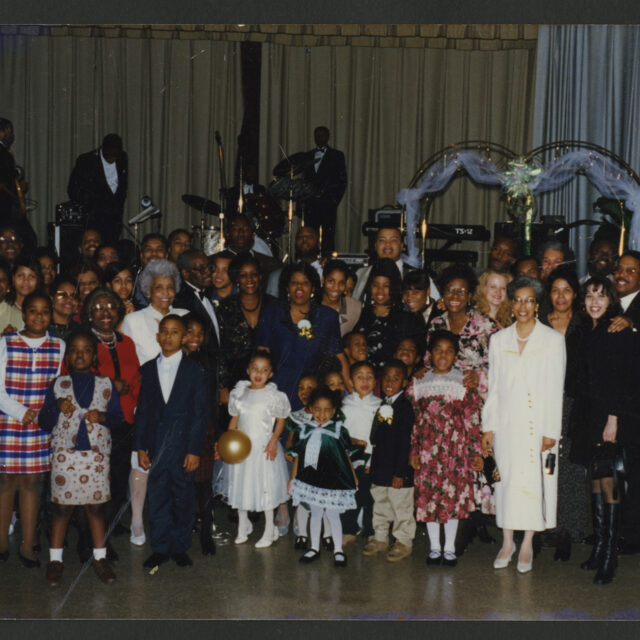 Venus Jones' family and friends gather for a picture at Venus' parents' 50th wedding anniversary.