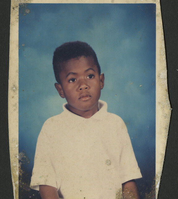 Venus Jones' son, Odell, poses for a photograph.
