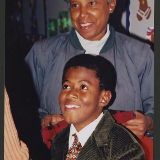 Venus Jones stands with her son, Odell.