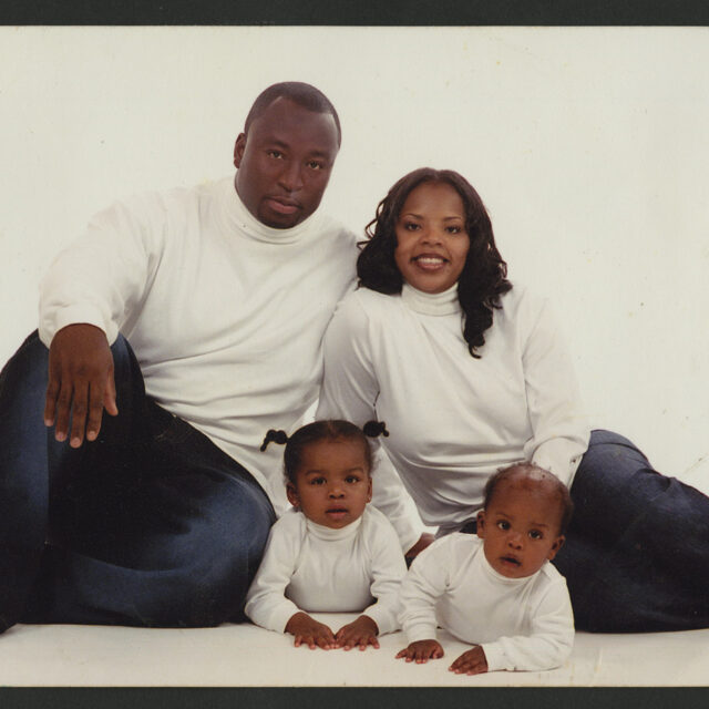 Russell Davis (who Venus Jones helped to raise and mentor) poses for a picture with his family.