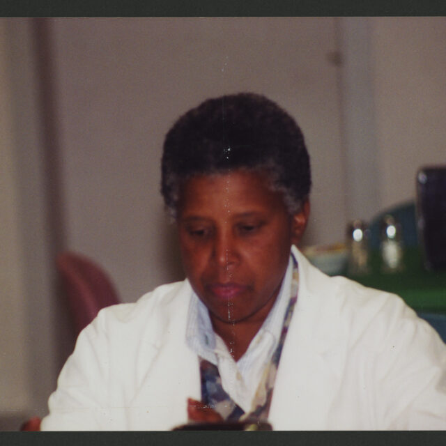 Gray-haired Venus Jones in the lab.
